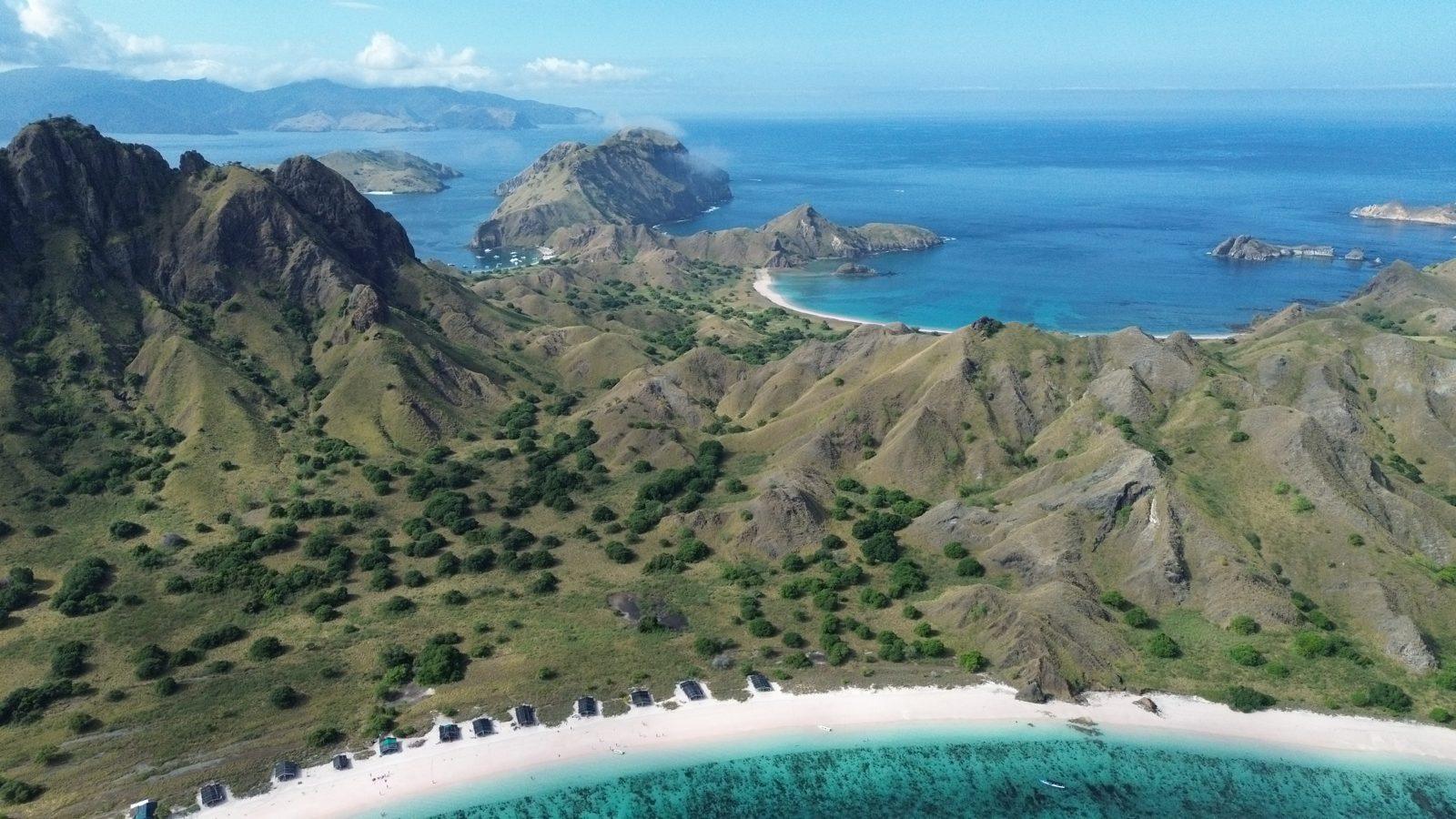 Padar – Aerial ridge, three bays, curved white beaches (Real photo from a KEXI trip)