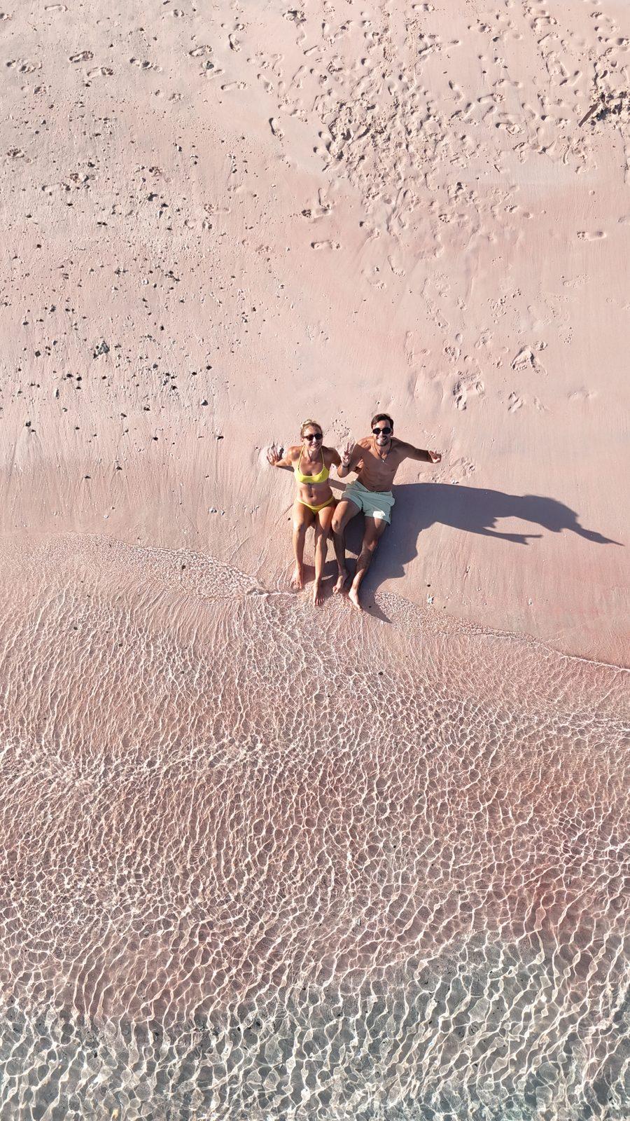 Pink Beach – group on pink sand, turquoise water (Real photo from a KEXI trip)